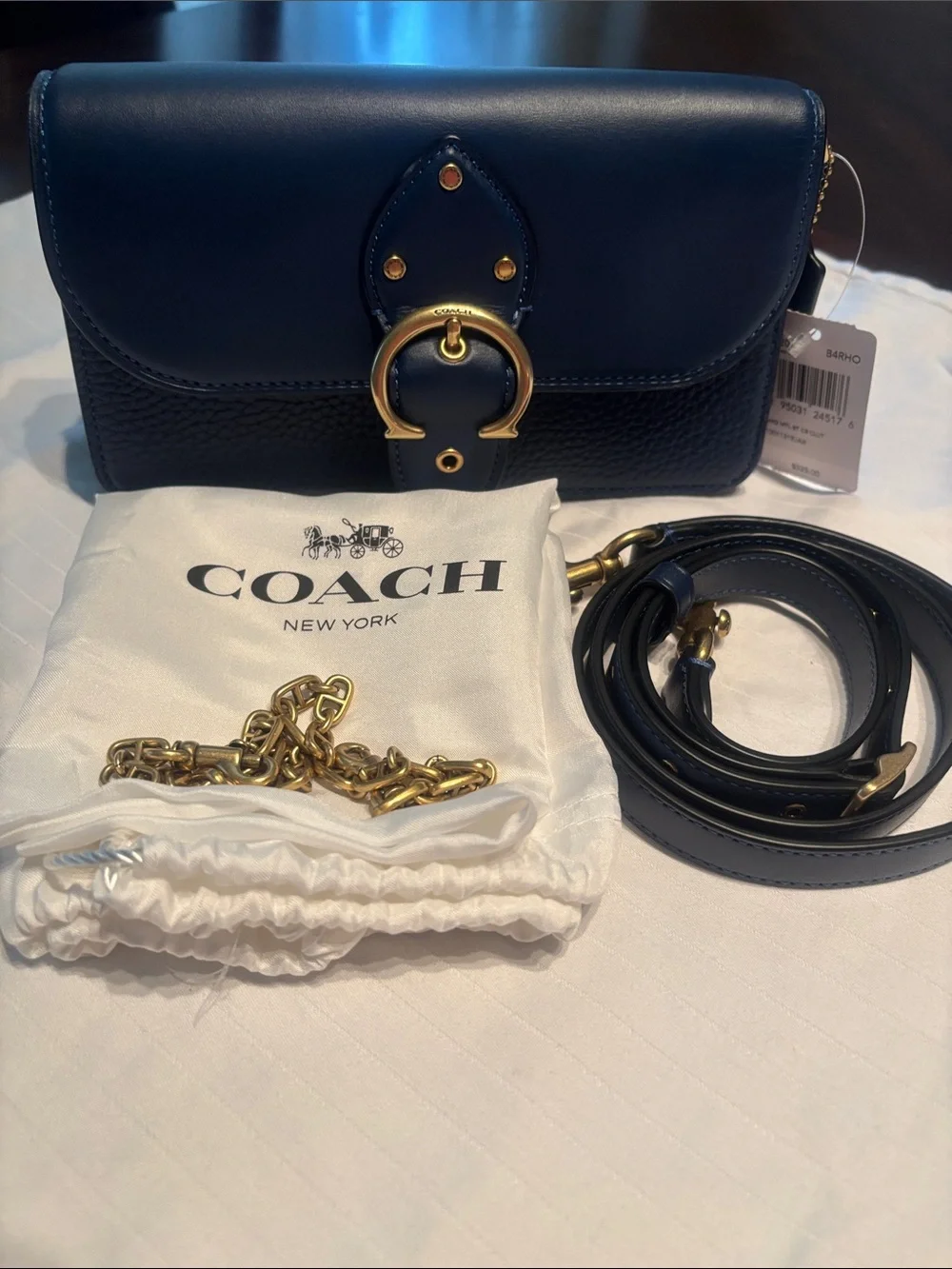 Coach sleek leather